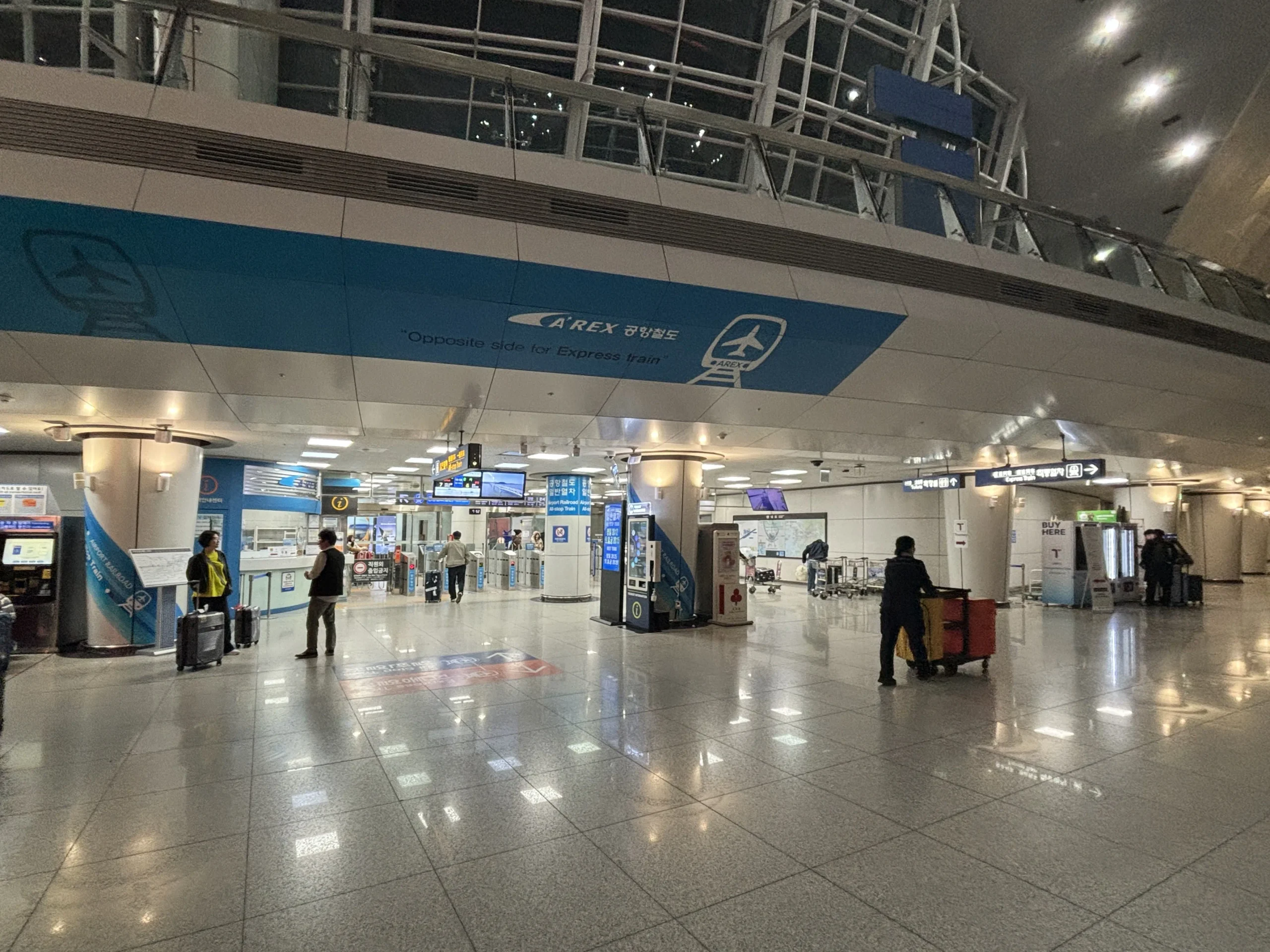 Blue AREX All-Stop Train entrance and ticket gates at Incheon Airport Terminal 1
