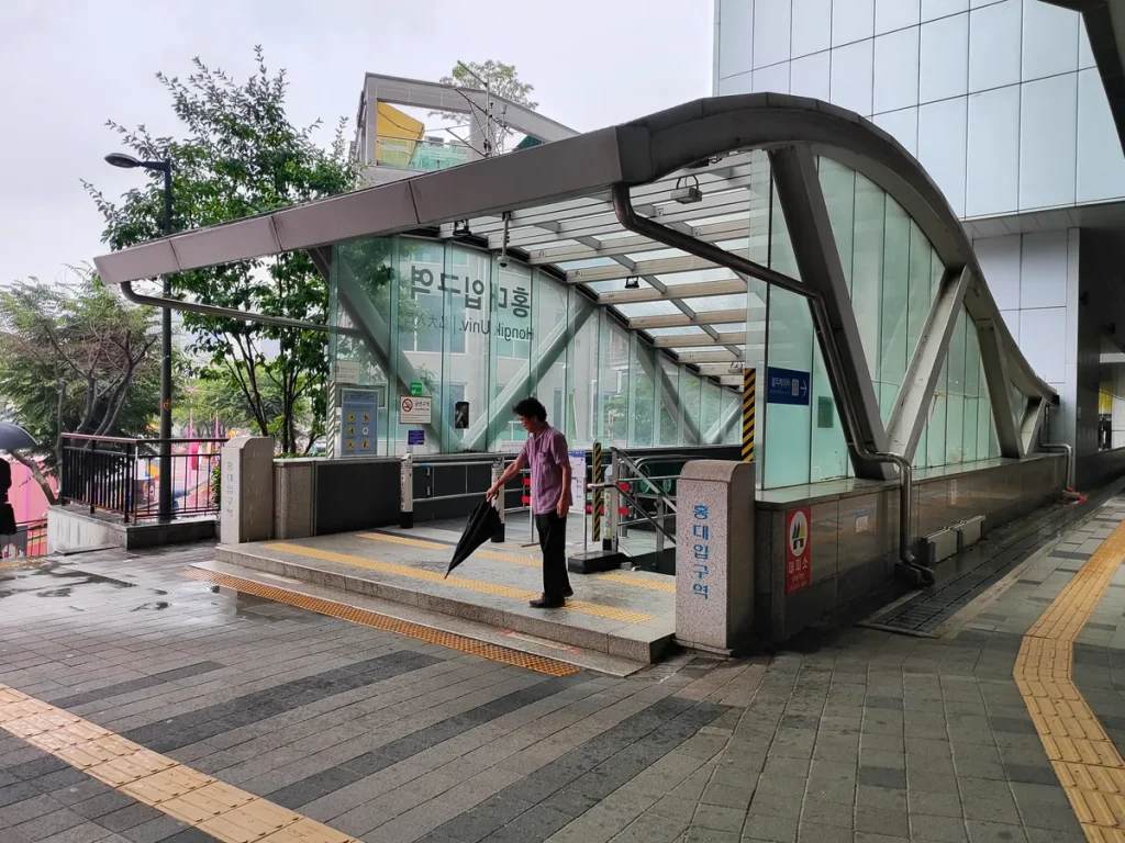 Street-level entrance to Hongik University Station Exit 6 in Seoul