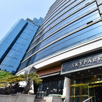Street-level entrance and facade of Hotel Skypark Central Myeongdong