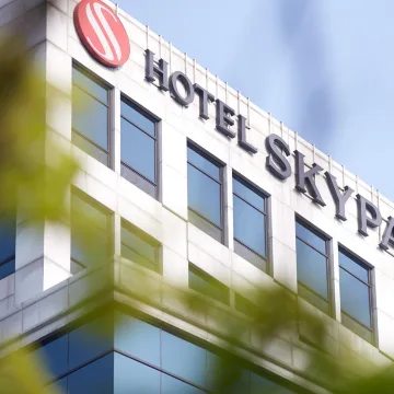 Exterior sign and upper facade of Hotel Skypark Central Myeongdong