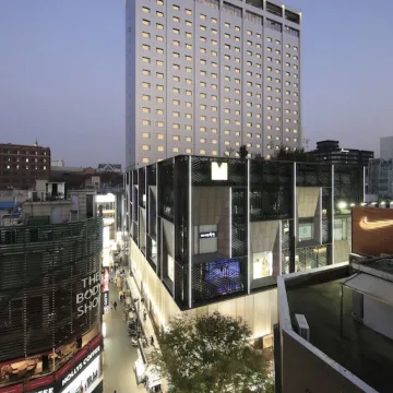 Solaria Nishitetsu Hotel building above the surrounding Myeongdong streets